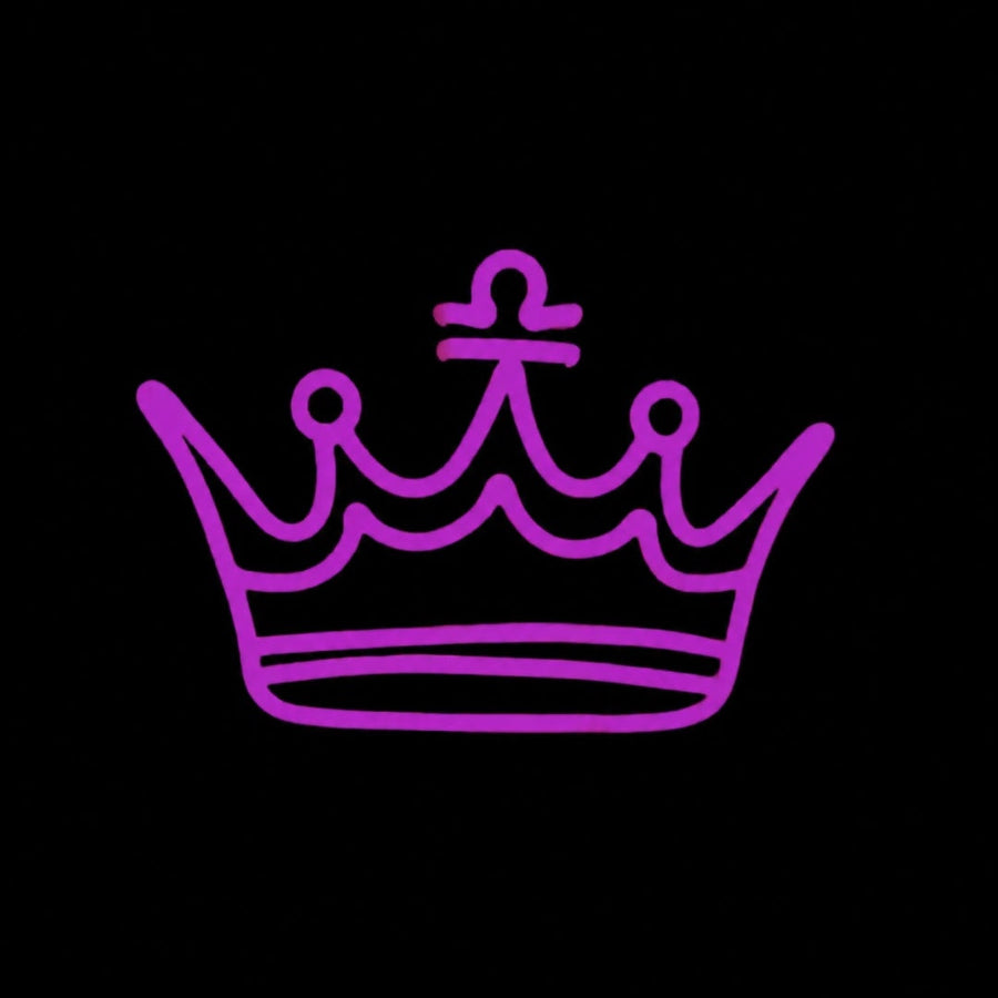 Libra neon headband glowing against a dark background